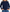 A woman wearing a navy blue crewneck sweater with colorful striped shoulder and sleeve panels, paired with blue jeans and layered gold necklaces. - Navy