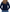 A woman viewed from the back wearing a navy blue knit sweater with colorful striped shoulder and sleeve accents, paired with blue jeans against a plain white background. - Navy