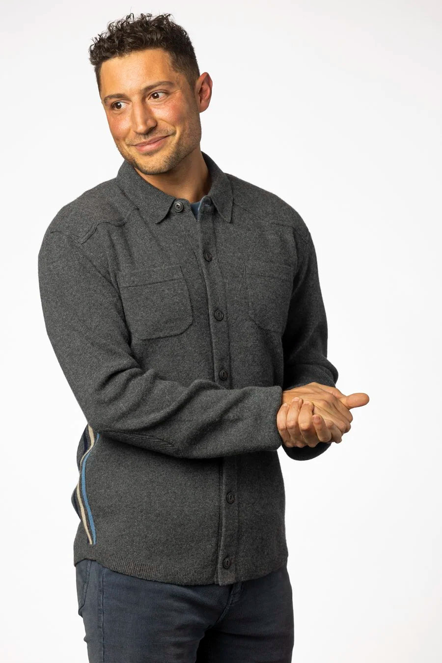 Man wearing a gray jacket on a white background